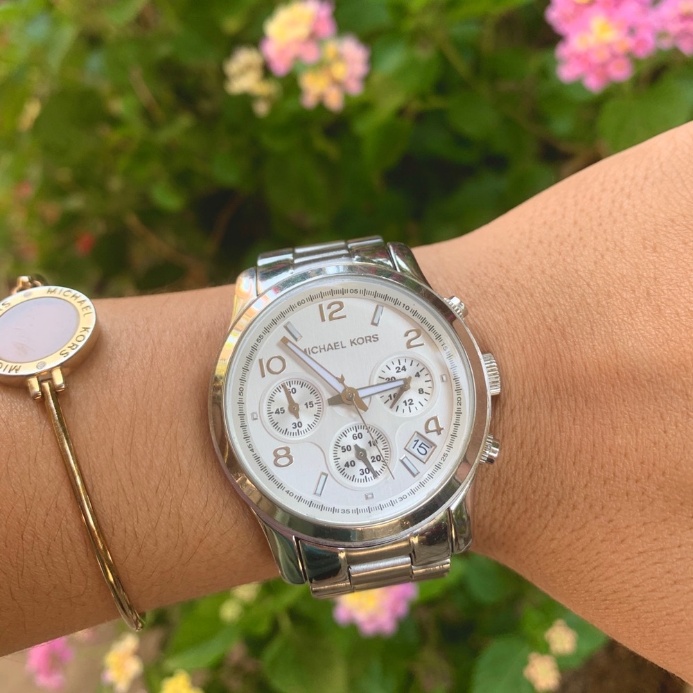 Woman’s boyfriend Micheal Kors watch